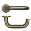 22mm Tubular Return to Door Lever on Round Rose 52mm x 8mm Push-on Rose - BS EN 1906 Grade 3 - Grade 201